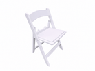 Angled view of Kid Size White Resin Folding Chair with padded seat,